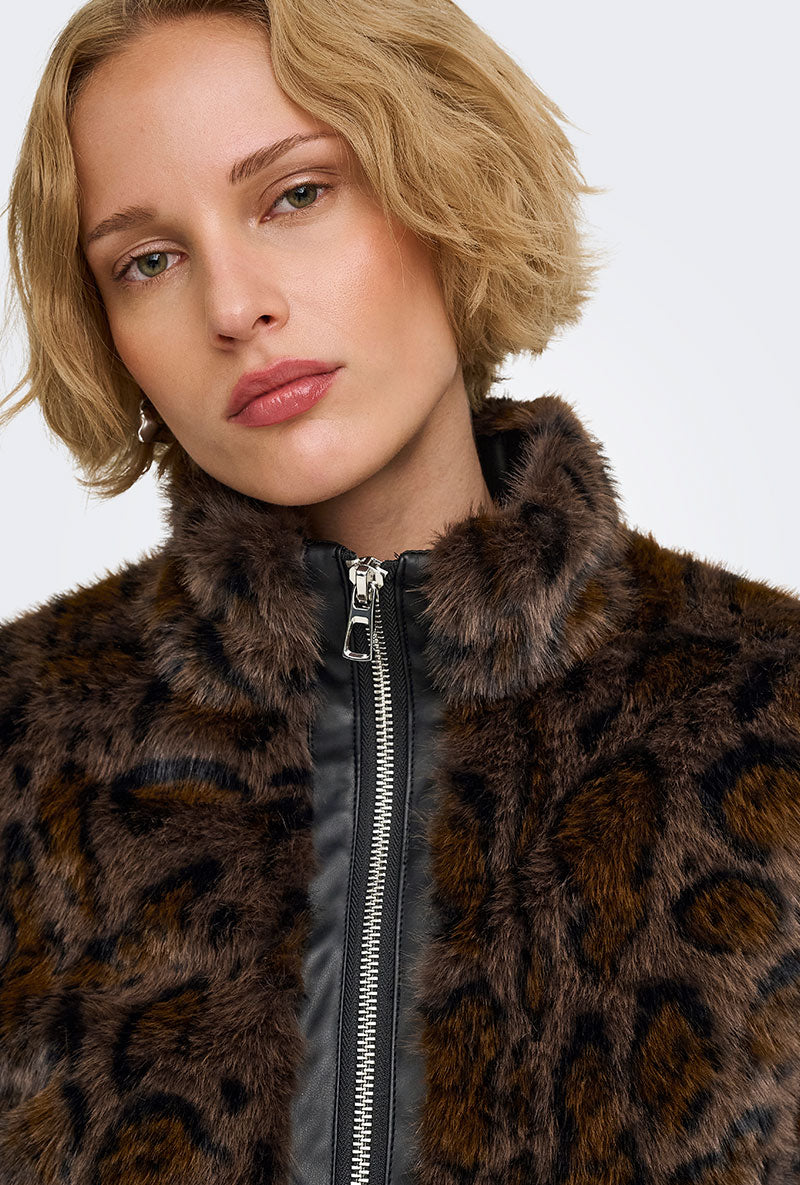 Front image of a model wearing Rikke faux fur jacket in black, by brand Only