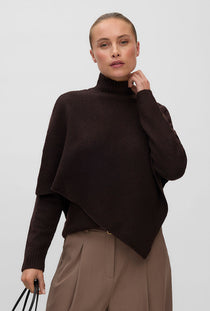 Front image of a model wearing the Camila ls cape higneck pullover in chocolate, by brand Vero moda