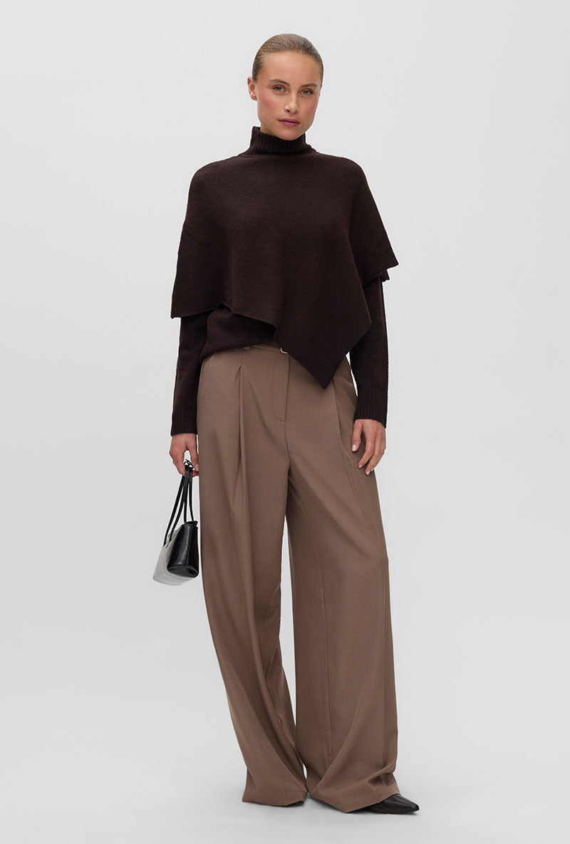 Front image of a model wearing Camila ls cape higneck pullover in chocolate, by brand Vero moda