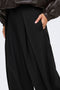 Front image of a model wearing the Yasmine mw pleat barrel pant in black, by brand Only