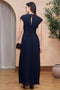 Back image of a model wearing the Angelie maxi dress in navy, by brand Tfnc