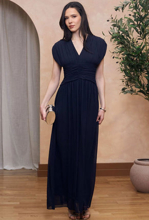 Front image of a model wearing Angelie maxi dress in navy, by brand Tfnc
