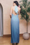 Back image of a model wearing the Casey maxi dress in aqua, by brand Tfnc
