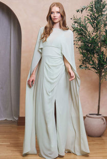 Front image of a model wearing the Lailah maxi dress in sage, by brand Tfnc