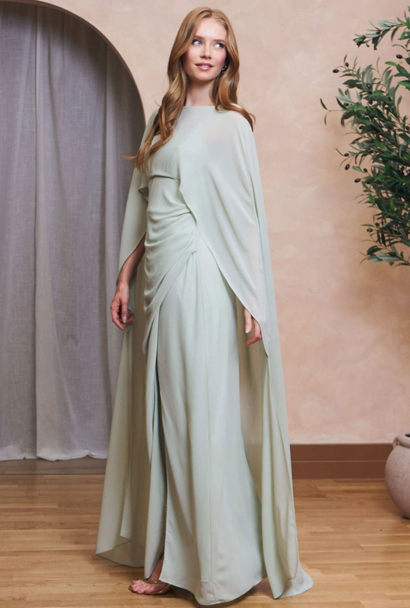 Front image of a model wearing Lailah maxi dress in sage, by brand Tfnc