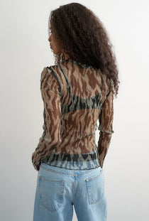 Back image of a model wearing the Beate ls crewneck mesh top in black, by brand Top shop