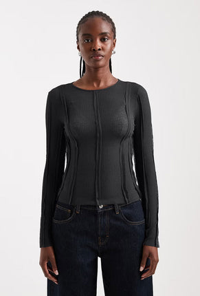 Front image of a model wearing Belma l/s oneck sheer top in black, by brand Top shop