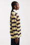 Side view image of a model wearing the Bibs ls stripe polo top in green, by brand Top shop