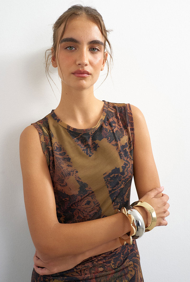 Front image of a model wearing Caisa mesh check maxi dress in brown, by brand Top shop