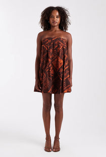 Front image of a model wearing the Calla bandeau mini dress in rust, by brand Top shop