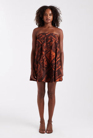 Front image of a model wearing the Calla bandeau mini dress in rust, by brand Top shop