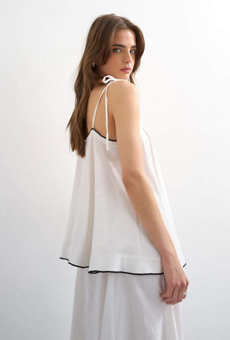 Back image of a model wearing Caro cami top in off white, by brand Top shop