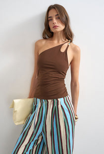 Front image of a model wearing the Marta one shoulder top in brown, by brand Top shop
