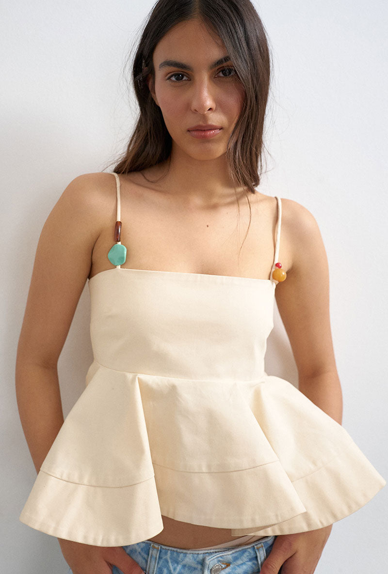 Front image of a model wearing Mina sl top in cream, by brand Top shop