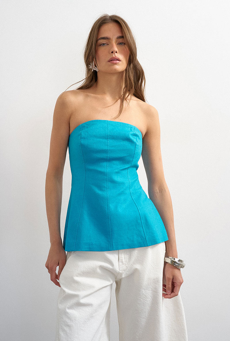 Front image of a model wearing Rosa tailored bandeau in blue, by brand Top shop
