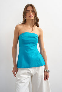 Front image of a model wearing the Rosa tailored bandeau in blue, by brand Top shop