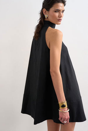 Back image of a model wearing the Sara sl trapeze mini dress in black, by brand Top shop