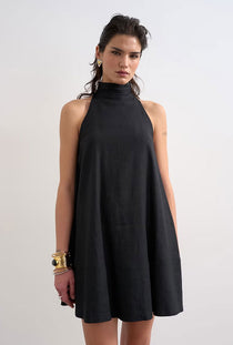 Front image of a model wearing the Sara sl trapeze mini dress in black, by brand Top shop