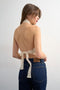 Back image of a model wearing the Sia bandana top in beige, by brand Top shop