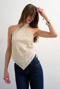 Front image of a model wearing the Sia bandana top in beige, by brand Top shop