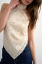 Front image of a model wearing the Sia bandana top in beige, by brand Top shop