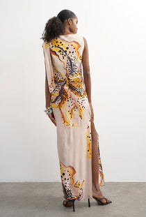 Back image of a model wearing the Vana tie neck maxi dress in beige, by brand Top shop