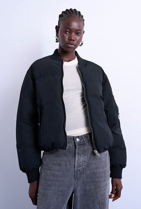 Front image of a model wearing Vera bomber in black, by brand Top shop