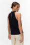 Back image of a model wearing the Easy joy s/l  halterneck top in black, by brand Vero moda