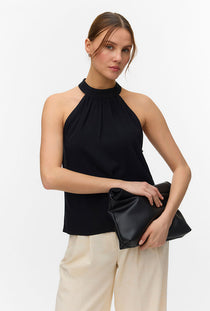 Front image of a model wearing the Easy joy s/l  halterneck top in black, by brand Vero moda