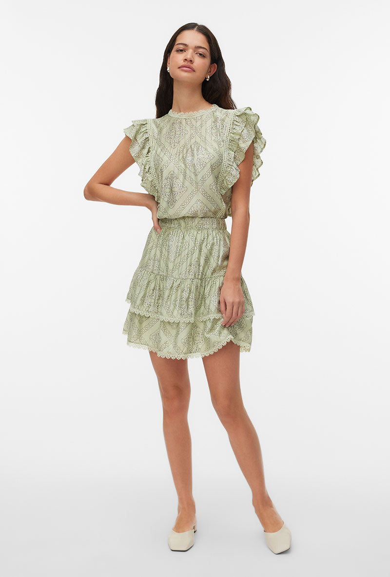 Front image of a model wearing Bliss s/l details top in green, by brand Vero moda