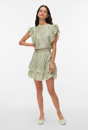 Front image of a model wearing the Bliss s/l details top in green, by brand Vero moda