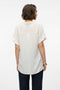 Back image of a model wearing the Bumpy ss shirt in white, by brand Vero moda