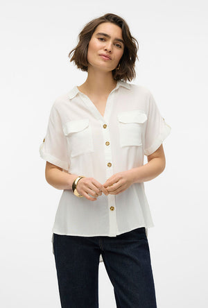 Front image of a model wearing the Bumpy ss shirt in white, by brand Vero moda