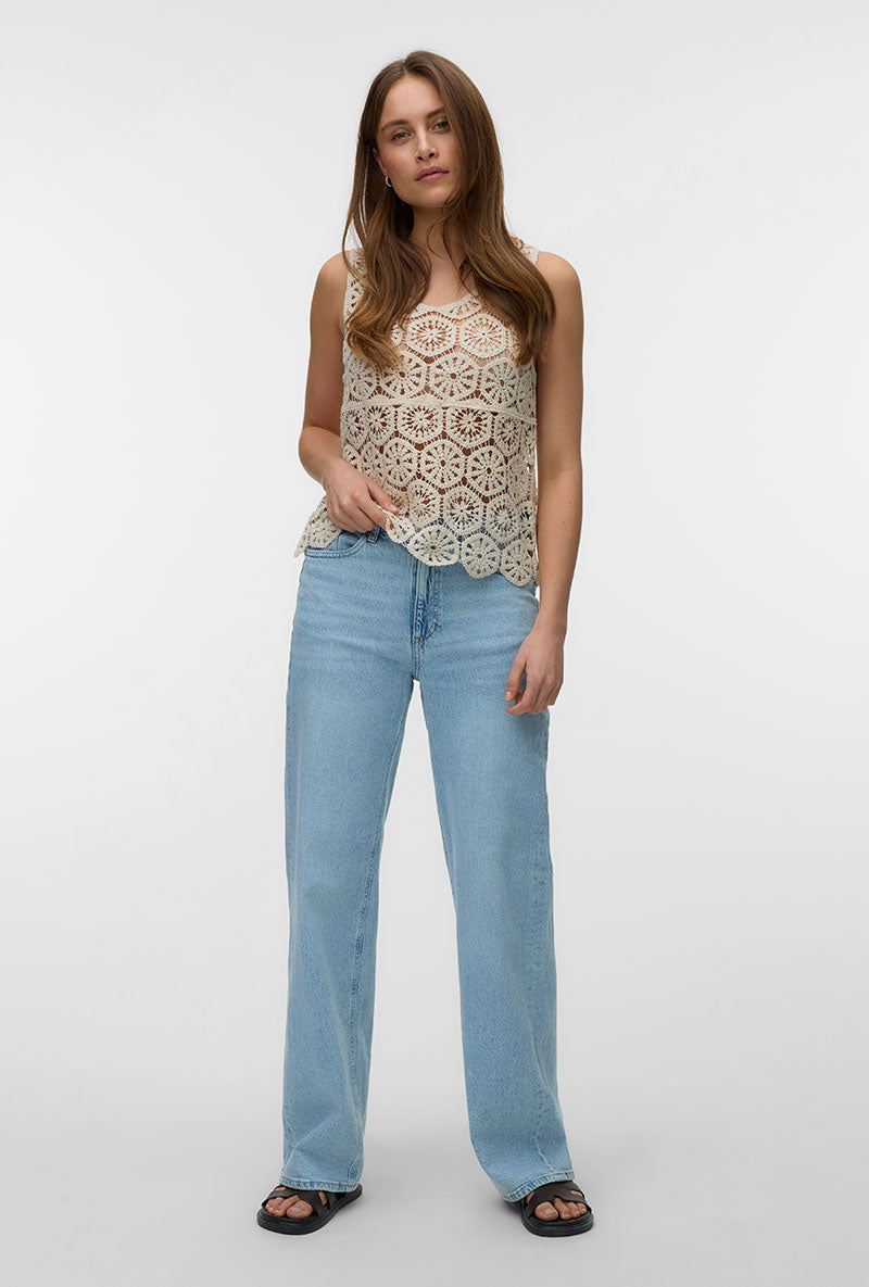 Front image of a model wearing Elsa sl crop top in beige, by brand Vero moda