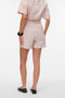 Back image of a model wearing the Glow hw shorts in pink, by brand Vero moda