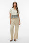 Front image of a model wearing Kai s/s shirt in beige, by brand Vero moda