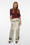 Front image of a model wearing the Lalita zola hw wide pant in beige, by brand Vero moda