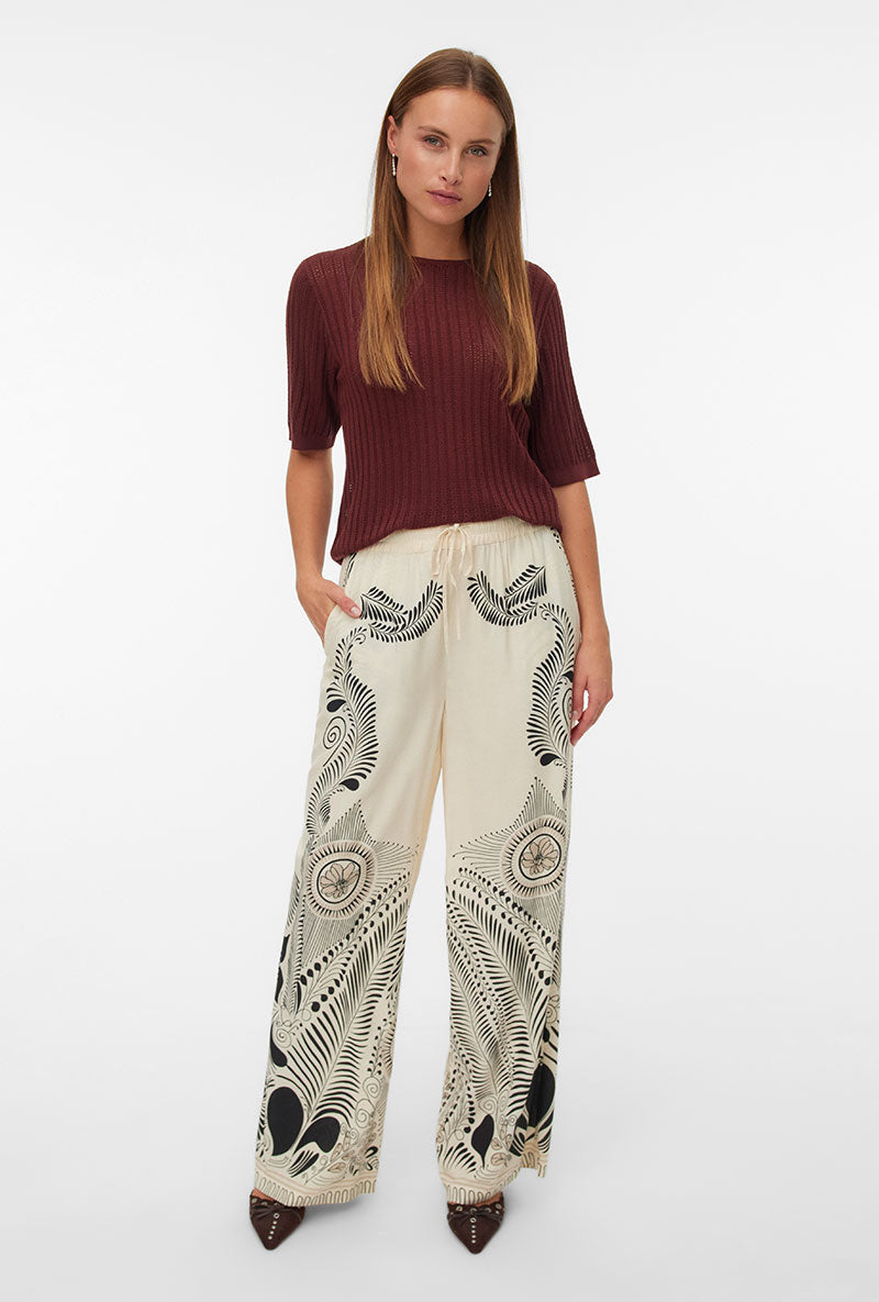 Front image of a model wearing Lalita zola hw wide pant in beige, by brand Vero moda