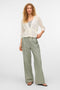 Front image of a model wearing the Lux light 3/4 v in off white, by brand Vero moda
