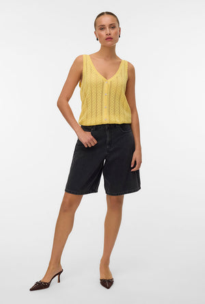 Front image of a model wearing the Lux light s/l top in yellow, by brand Vero moda