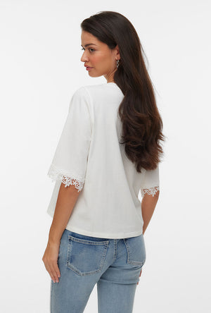Back image of a model wearing the Lyla ss oneck top in white, by brand Vero moda