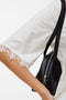 Front image of a model wearing the Lyla ss oneck top in white, by brand Vero moda