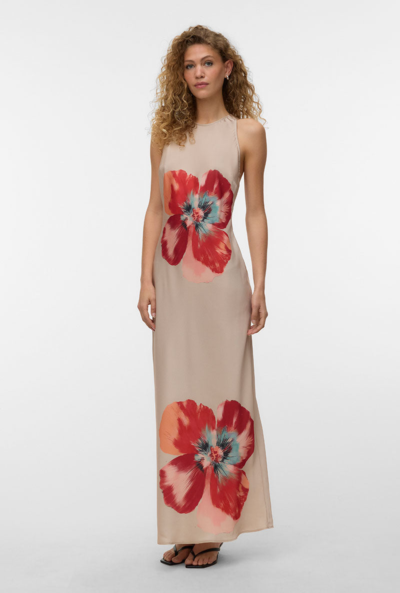 Front image of a model wearing Reba hibisca ankle dress in beige, by brand Vero moda