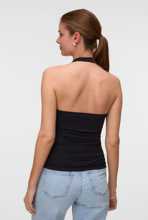 Back image of a model wearing the Valerie halterneck top in black, by brand Vero moda