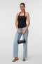Front image of a model wearing the Valerie halterneck top in black, by brand Vero moda