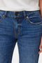 Front image of a model wearing the Asta lr bootcut jeans in denim, by brand Vero moda