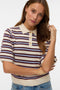 Front image of a model wearing the Canna 2/4 poloneck pullover in beige, by brand Vero moda
