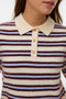 Front image of a model wearing the Canna 2/4 poloneck pullover in beige, by brand Vero moda