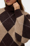 Front image of a model wearing the Darla ls rollneck pullover in chocolate, by brand Vero moda