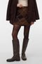 Front image of a model wearing Darla nw short skirt in brown, by brand Vero moda